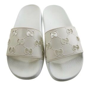 Gucci Women's Off-White Embossed Sandals